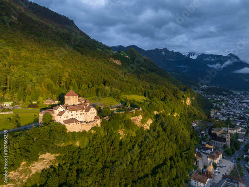 Vaduz Castle in Liechtenstein. Picturesque view of fairytale castle in Alps mountains at Sunset Time. A Landmark Aerial