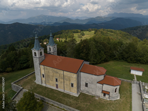 Aerial view of Marijino Celje church near Gorenja vas, Soca valley, Slovenia photo