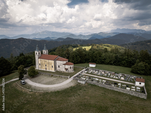 Aerial view of Marijino Celje church near Gorenja vas, Soca valley, Slovenia photo