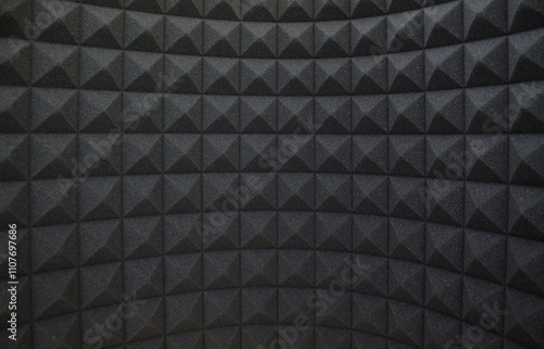 Recording studio cabin background with black acoustic foam for soundproofing