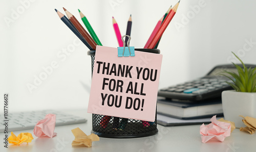 written THANK YOU FOR ALL YOU DO! - concept of bonus year end or holiday gift money for team staff employee to say thanks to theo photo