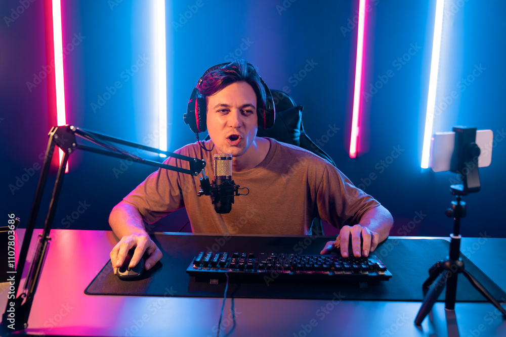Host Streamer Host channel of gaming smart streamer playing online game, wearing ...