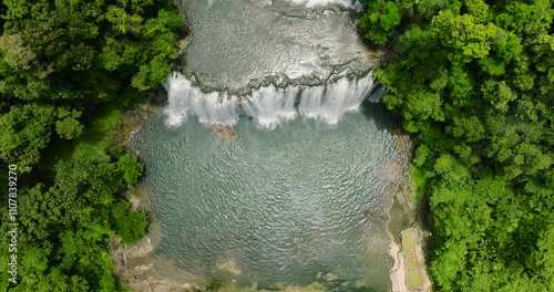 Tinuy-an Falls with turquoise water plunge pool. Bislig, Surigao del Sur. Philippines. photo