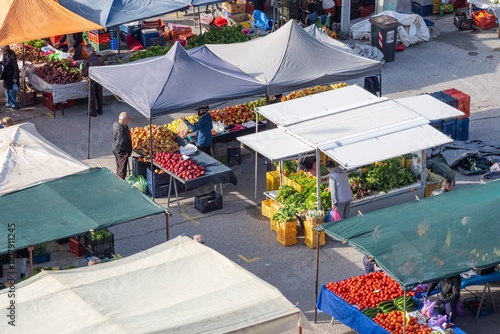 Fototapeta Naklejka Na Ścianę i Meble -  Laiki market in the Greek city of Kastoria, where you can buy fresh vegetables and fruits. Life in Greece