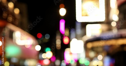 Defocused Shot Of Night Life In London West End Busy With Lights People And Traffic