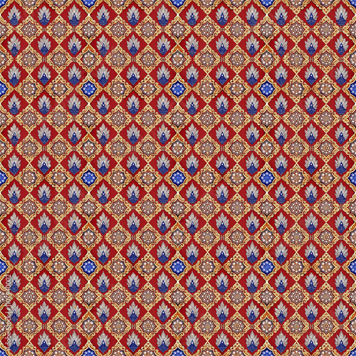 Red and Blue Geometric Pattern: A seamless, repeating pattern featuring intricate geometric shapes in shades of red, blue, and gold.