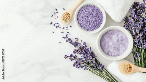 A relaxing spa setting with lavender flowers, bath salts, and soft towels on a marble background for a calming wellness experience. photo