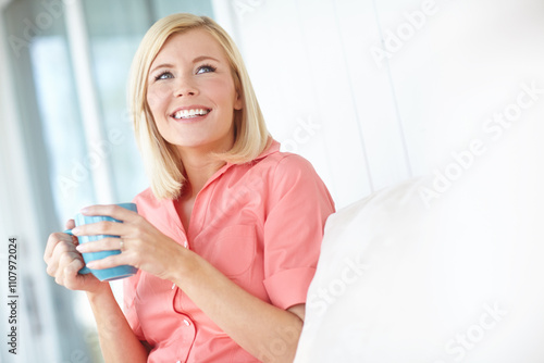 Woman, thinking and home for espresso plan, smile and dream of opportunity for self growth in lounge. Female person, tea and couch for happy reflection on decision, remember memory and perspective photo