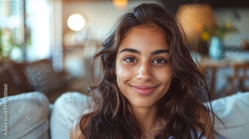Wallpaper Mural The image depicts a young woman with long wavy brown hair and dark eyes smiling at the camera. Torontodigital.ca