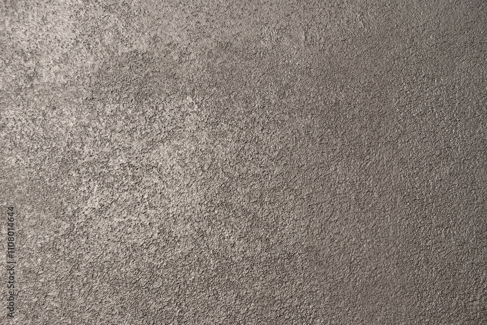 Fototapeta premium wall of black decorative plaster background texture