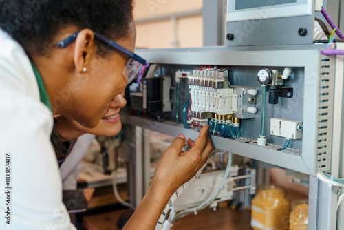 Diverse Female Engineers Program Robotics in Classroom