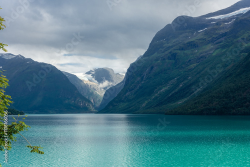 Landscape of the Lovatnet glacial lake with turquoise crystal clear water,  Norway photo