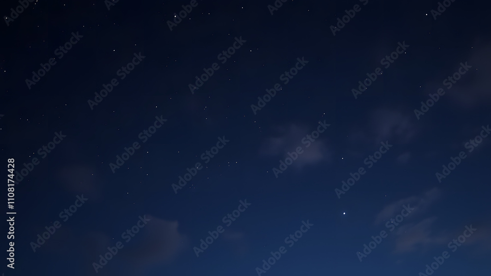 Fototapeta premium A magical night sky with faint clouds and subtle glowing stars on a dark navy background 