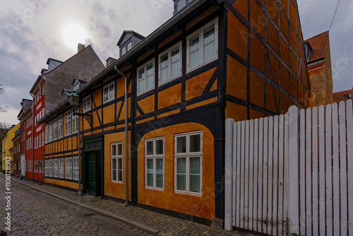 Terraced old tenement houses, painted in different colors photo