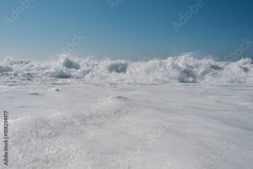 Incoming wave on a clear sunny day