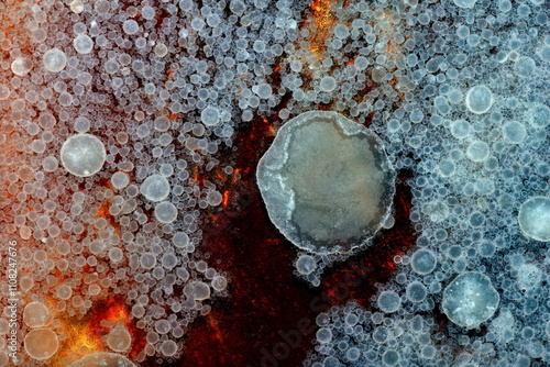 Inside the liquid texture of oil.