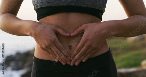 Bild auf Leinwand Woman, hands and balance with stomach for gut health, fitness or belly wellness in nature