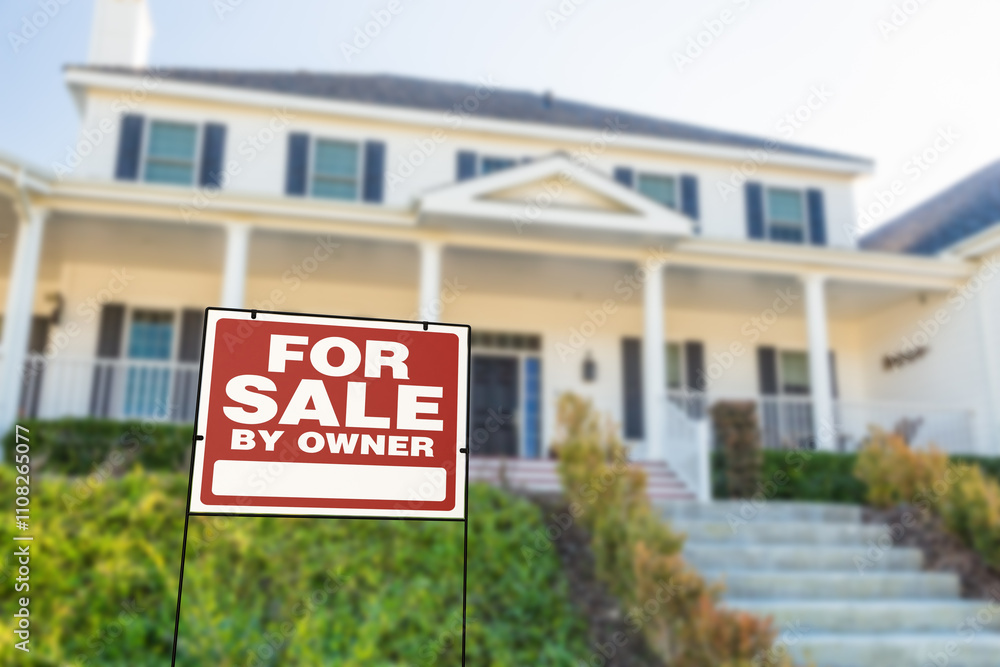 For Sale By Owner Real Estate Yard Sign In Front of House. For Sale By Owner Real Estate Yard Sign In Front of House.