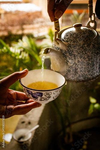 Pouring tea in a cup, Tea in cup, Pouring tea into a cup, Peshawari Kehwa, Peshawar Tea, Green Tea, Kehwa, Kawa, Peshawar special kehwa, Peshawar culture, Pathan culture, People of peshawar