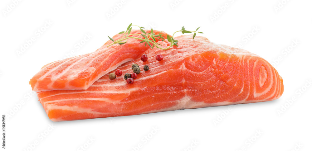 Pieces of fresh salmon, peppercorns and thyme isolated on white Pieces of fresh salmon, peppercorns and thyme isolated on white