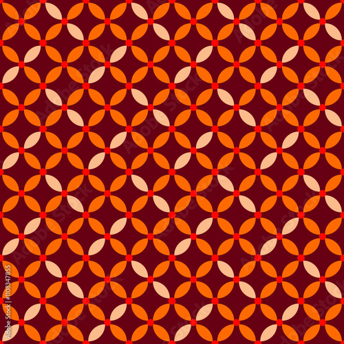 A repeating geometric pattern featuring interlocking shapes in shades of orange and beige against a dark background.