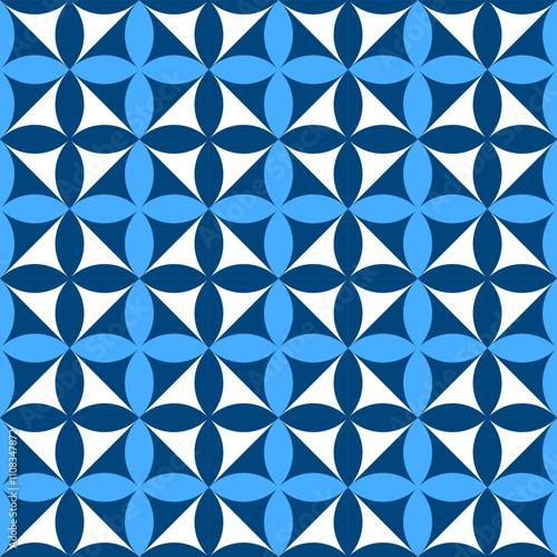 A geometric pattern featuring blue and white shapes arranged in a repetitive, symmetrical design.
