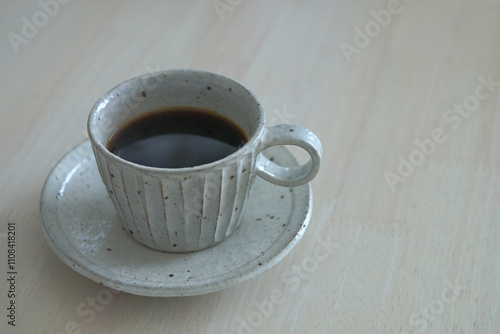 コーヒーが入ったカップ