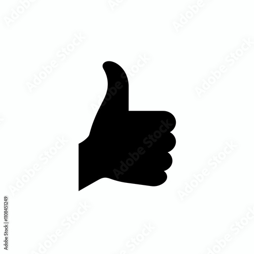 Hand gesture of approval shown with a raised black thumb during a casual moment