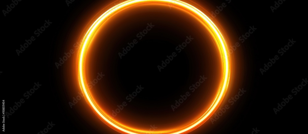 Naklejka premium A glowing orange circle resembling a solar eclipse or ring of fire.