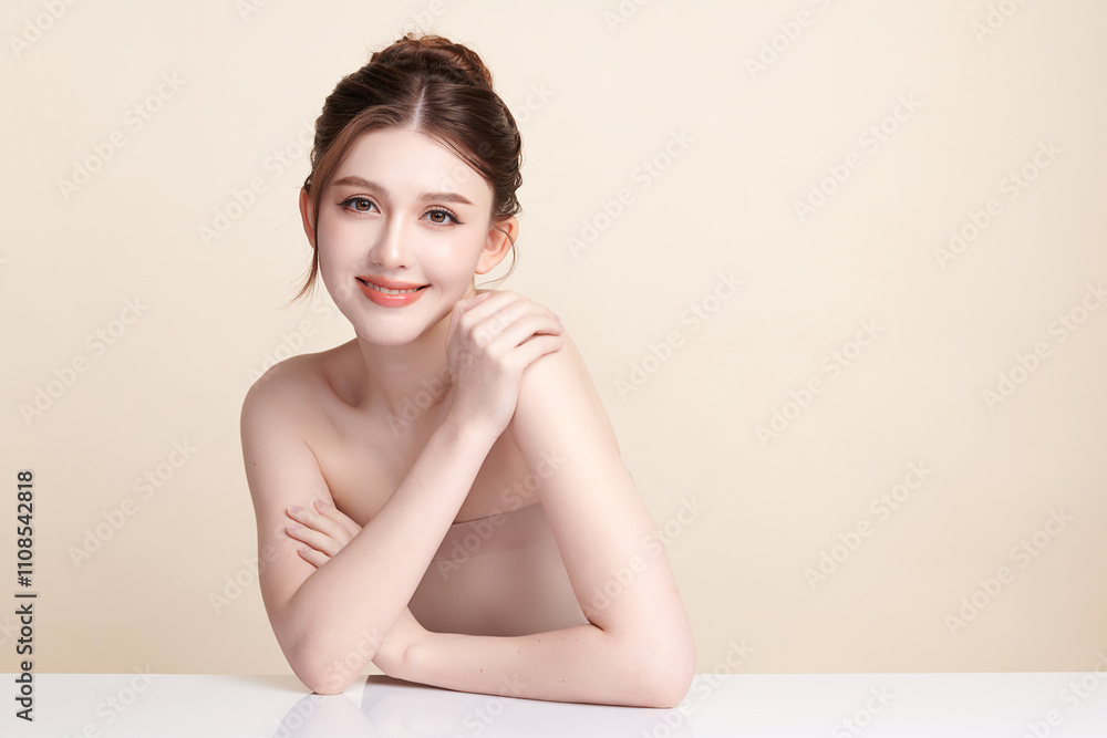 Obraz premium Beautiful young asian woman with clean fresh skin on beige background, Face care, Facial treatment, Cosmetology, beauty and spa, Asian women portrait.