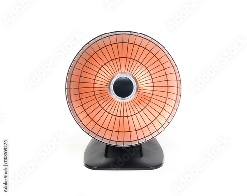 Radiant heater or infrared heater. Indoor space heater. Energy efficient heating that warms up objects not air. Black round floor heater with orange glow. Selective focus. White background. photo