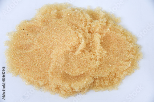 Microbeads of ion-exchange resin (ion-exchange polymer) Wet resin filtration for water purification on white background