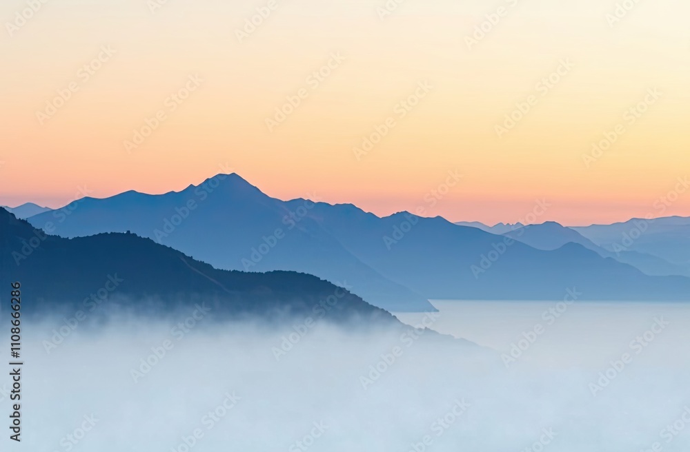 Fototapeta premium Early morning mist blankets the mountains as pastel colors of dawn rise above the horizon, creating a serene atmosphere by the water. Generative AI