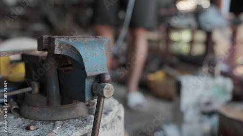 Mechanic man working repair elelctric drill motor in home