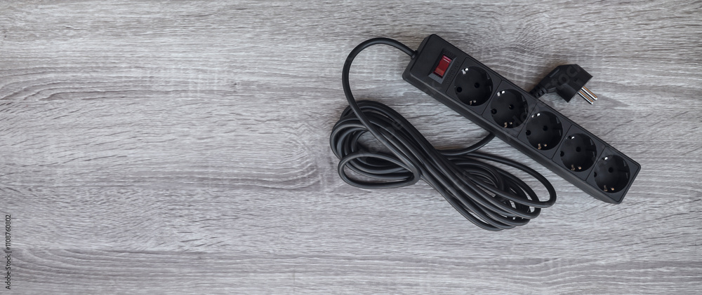 Fotografía black plastic surge protector