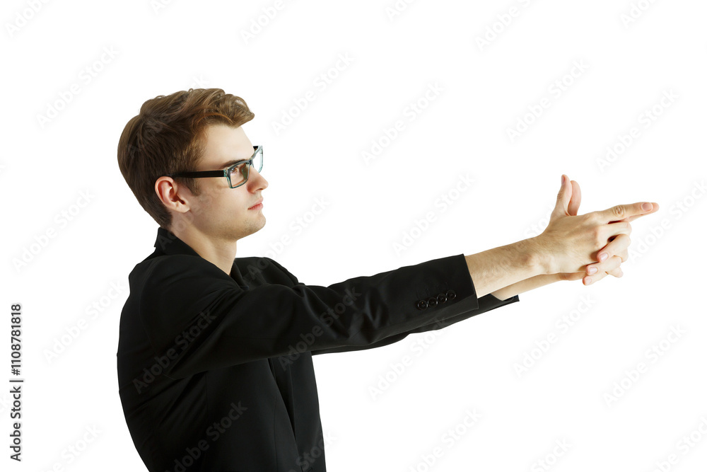 © peshkova - Side view of a man in glasses, wearing a dark suit, making a hand gesture resembling a pointing motion. Isolated on white background, concept of communication © peshkova - Side view of a man in glasses, wearing a dark suit, making a hand gesture resembling a pointing motion. Isolated on white background, concept of communication