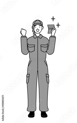 A mechanic woman in coveralls who is pleased to see a bankbook.