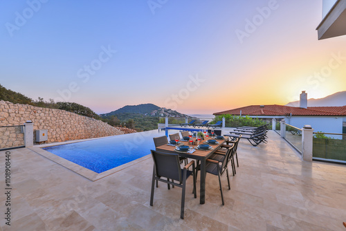 Obraz na płótnie Luxury villa with infinity pool overlooking the stunning sea view w salonie
