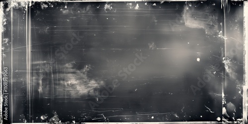 Moody gray film texture with light leaks and scratches. Vintage photographic overlay with damaged edges. Atmospheric analog effect for retro design. 8k