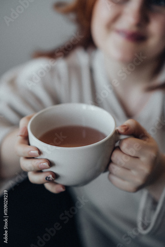 woman with cup of tea