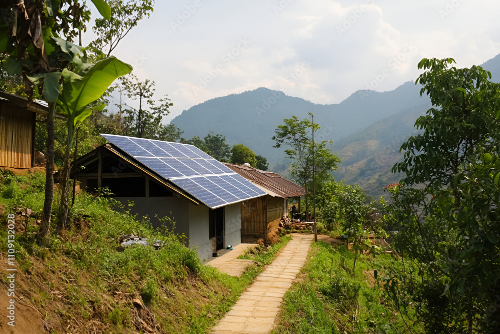 Scenic view of a rural home in the mountains, showcasing solar panels installed on the roof, promoting eco-friendly energy use in remote areas. Scenic view of a rural home in the mountains, showcasing solar panels installed on the roof, promoting eco-friendly energy use in remote areas.