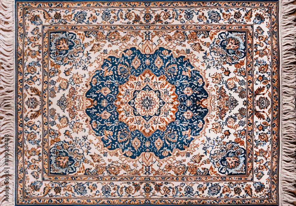 Fototapeta premium Persian Rug with Blue and Beige Medallion and Floral Details
