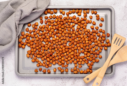Food photography of roasted crispy chickpeas with  paprika, chili and herbs, plant protein, dietary fibre, healthy vegan food