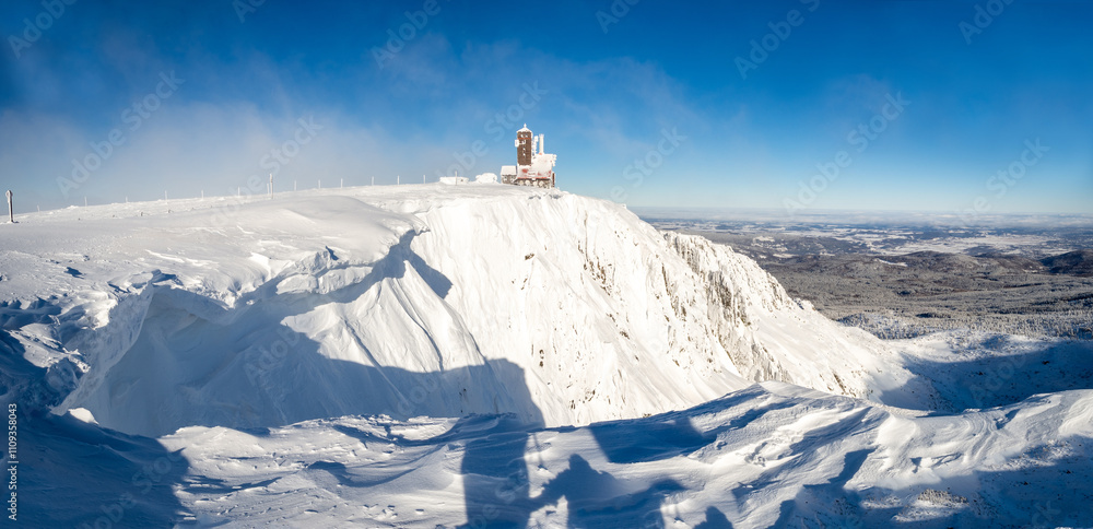 panoramic view on Sniezne Kotly - famous valley in Giant mountains during winter sunny day in Poland