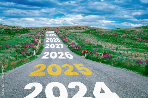 2025 New Year road trip travel and future vision concept . Nature landscape with highway road leading forward to happy new year celebration in the beginning of 2025 for elation and successful start .