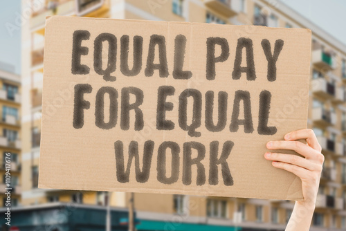 Canvastavla The phrase 'Equal pay for equal work' displayed on a banner held by a person
