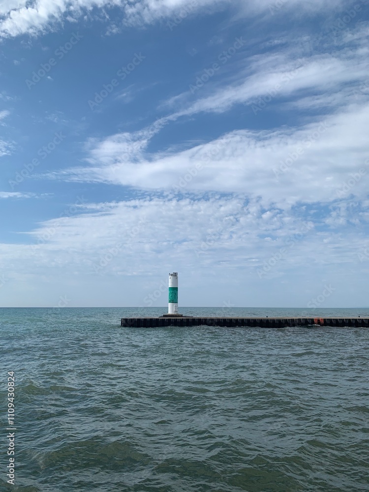 Serene Calm Waters Leading to a Red Lighthouse Serene Calm Waters Leading to a Red Lighthouse