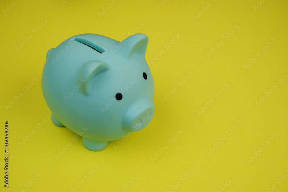 Piggy bank on yellow background. Saving money concept. Room for text. Piggy bank on yellow background. Saving money concept. Room for text.