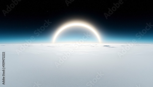 A serene view of a horizon with a glowing arc above a snowy landscape.