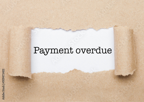 Canvas Print Payment Overdue text appearing behind brown paper